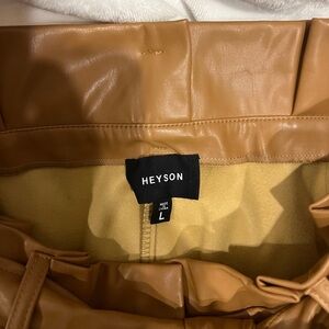 Size L faux leather pants with tie belt